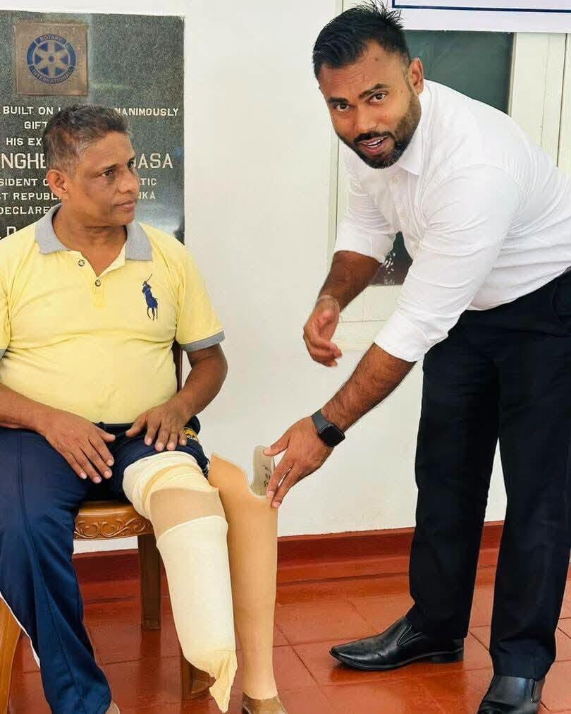 A man is fitted with an artificial leg