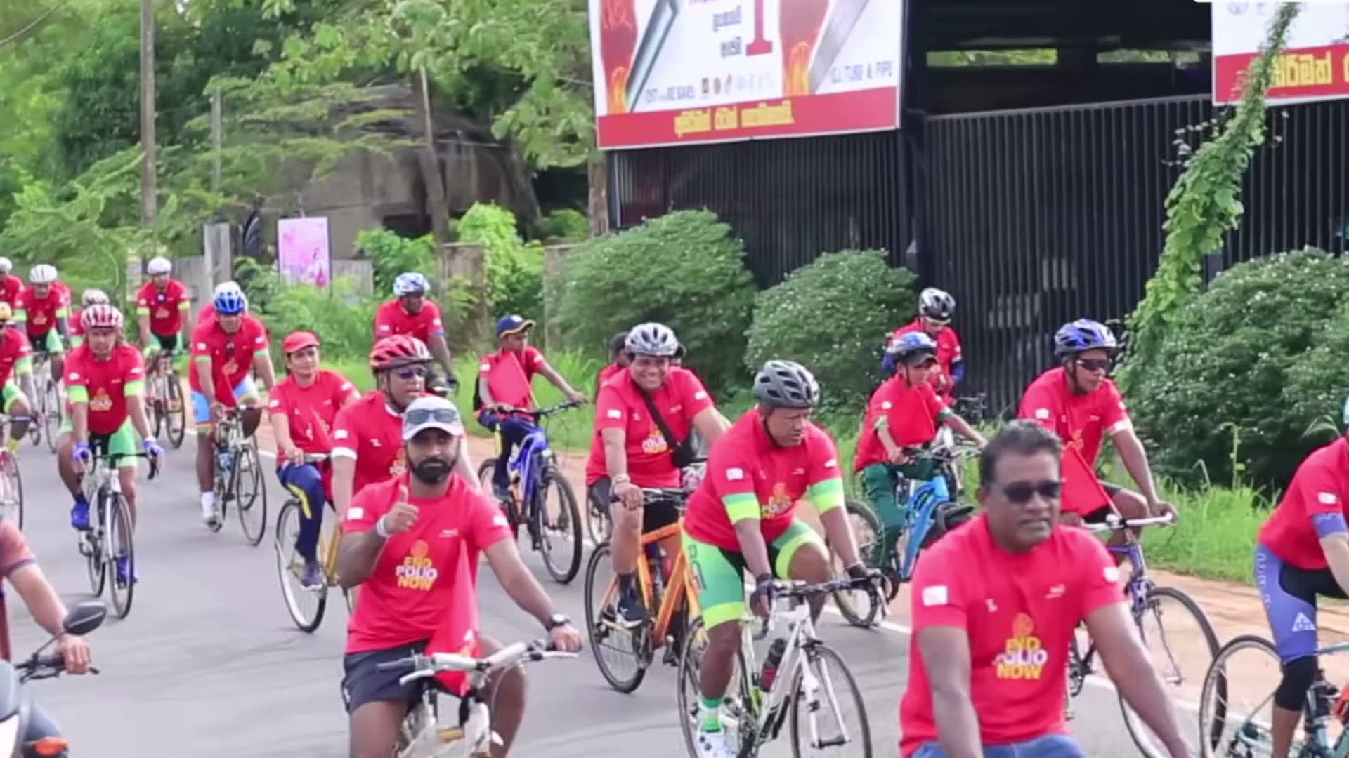 Rotarians in Sri Lanka handing out supplies, cycling for polio awareness, tea country and the coast